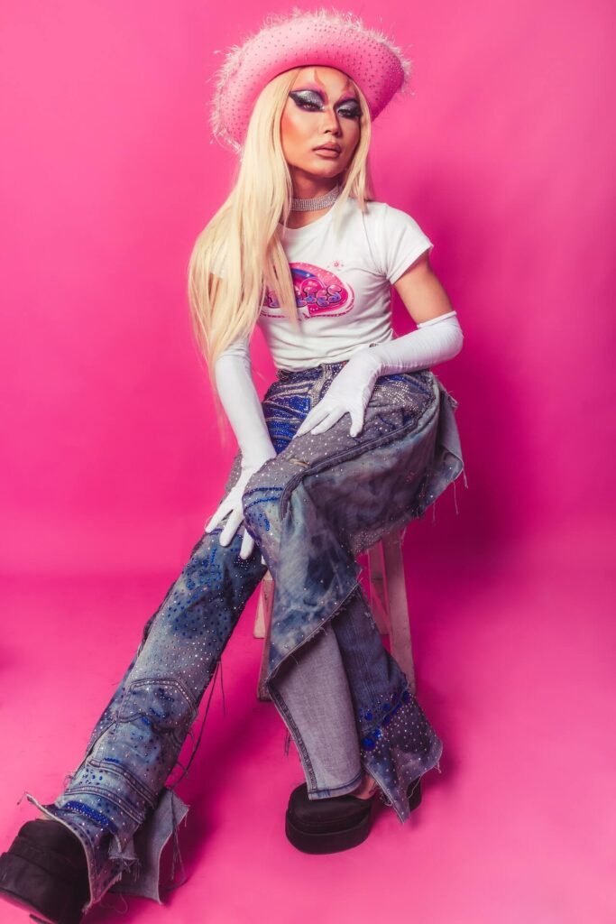 A blonde model is dressed as Barbie