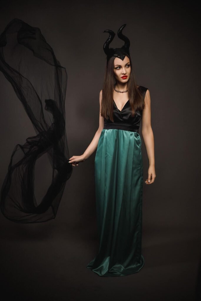 A woman is dressed up as the female Halloween character Maleficent