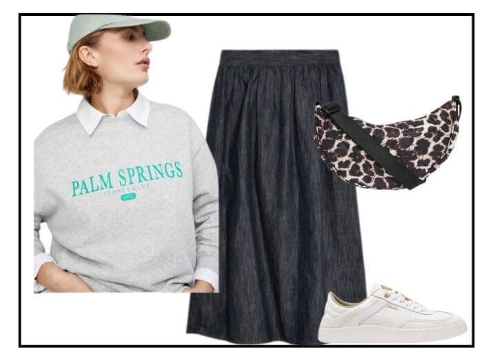A sport luxe outfit with a grey sweatshirt, a black maxi skirt, a leopard print cross body bag and a pair of white trainers.