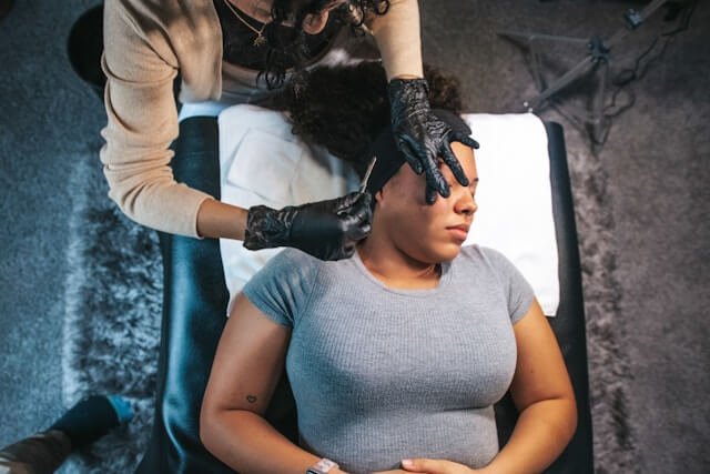 A woman is having a professional dermaplaning treatment