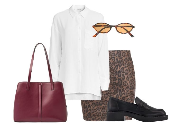 9 leopard skirt outfit ideas: Flat lay including a white oversized shirt, a leopard print mini skirt, oval sunglasses, a red tote bag, and black loafers.