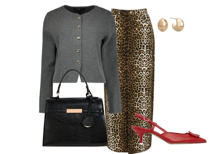 9 leopard skirt outfit ideas: Flat lay including a midi leopard print skirt, a fitted grey cardigan, red kitten heels, a black handbag, a gold tear shaped earrings. 
