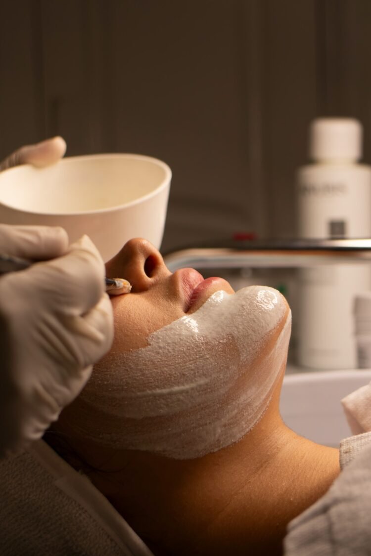 A woman is having a facial treatment