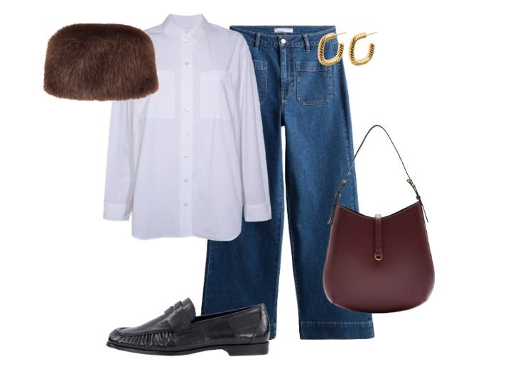 How to style wide leg jeans in Winter.
Outfit: Blue wide leg jeans, a white oversized shirt, a brown fur hat, a burgundy handbag, black loafers and gold hoop earrings.